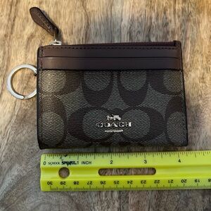 Coach Monogram Mini Skinny in Signature Canvas
